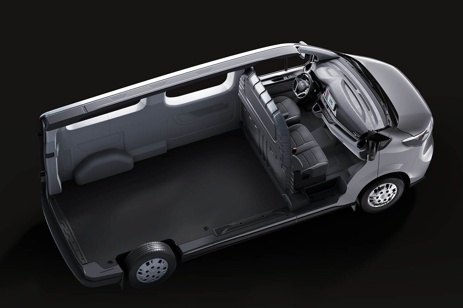 Ansicht eines Fahrzeugs von oben, zeigt den Innenraum mit Sitzen und stehendem Raum.